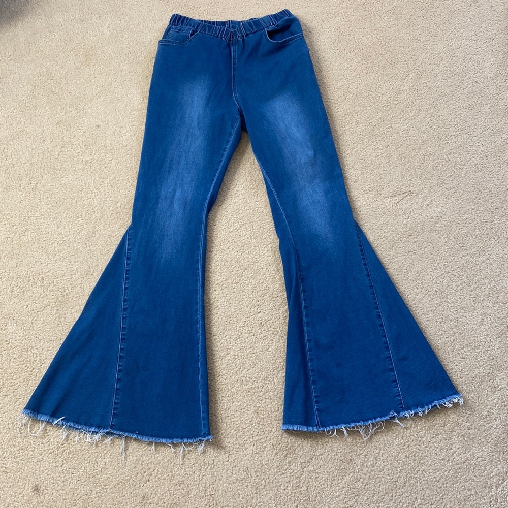 Size small flare jeans. Elastic stretch waist.